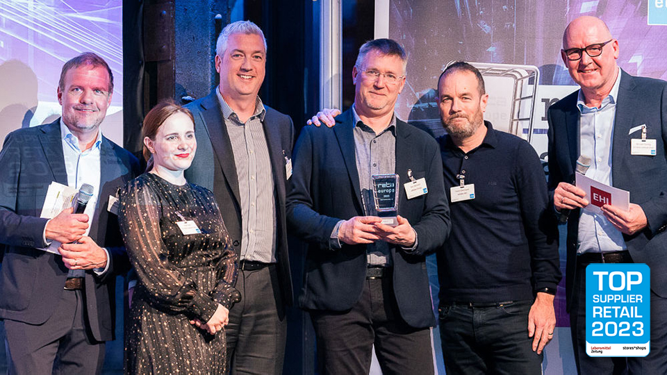 sensormatic solutions adidas team receiving reta 2023 to retailer supplier award