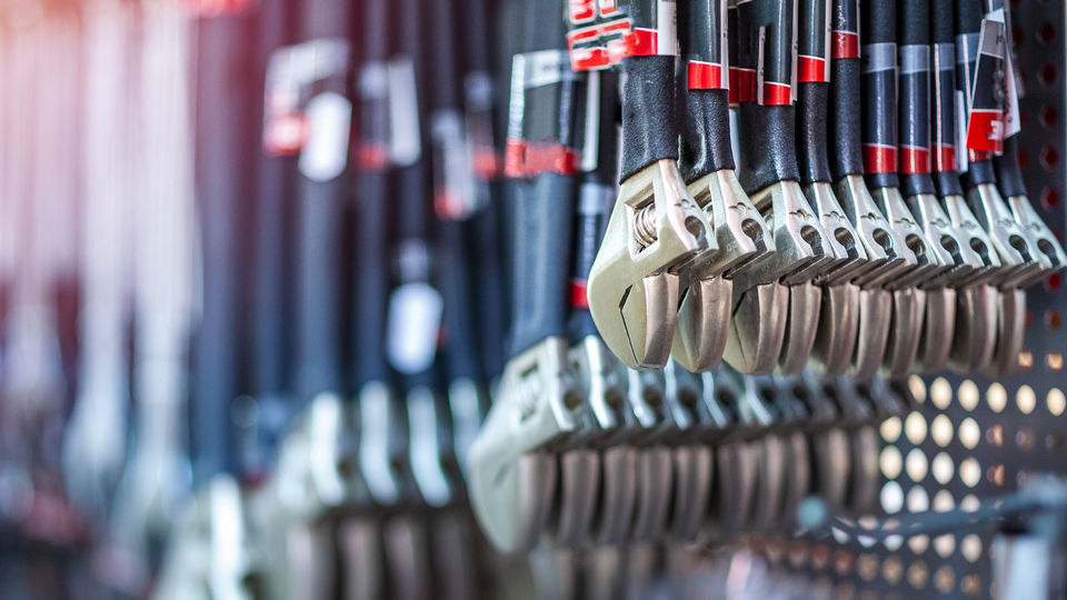 display wall holding adjustable wrenches in diy retail store