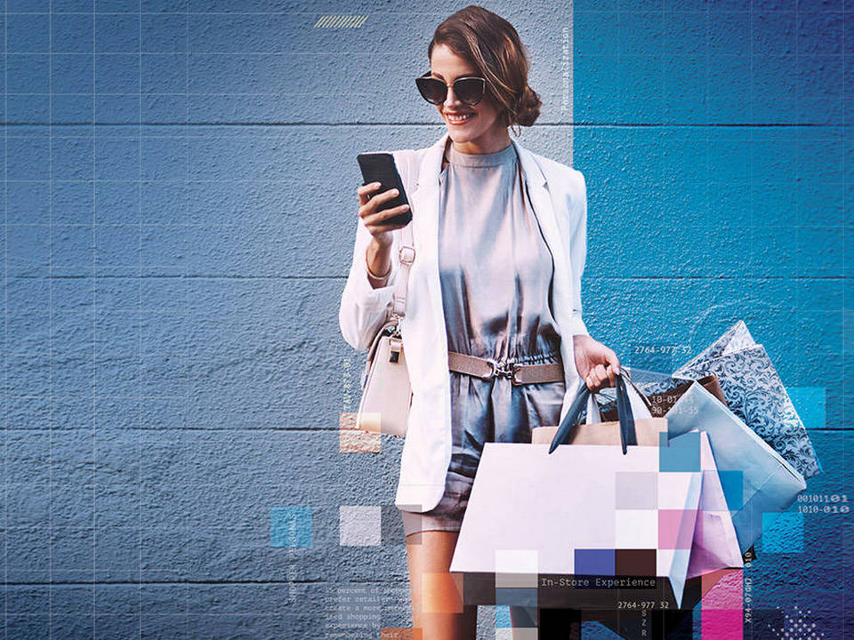 fashionable woman carrying shopping bags in front of a computer-generated grid with data in front of and behind her